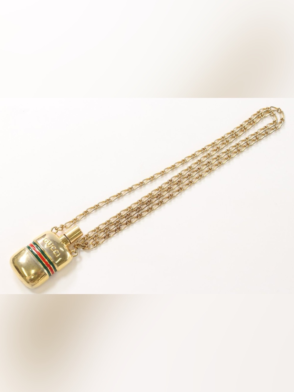 Vintage Gucci Gold-Tone Perfume Bottle Necklace with Green and Red Stripes